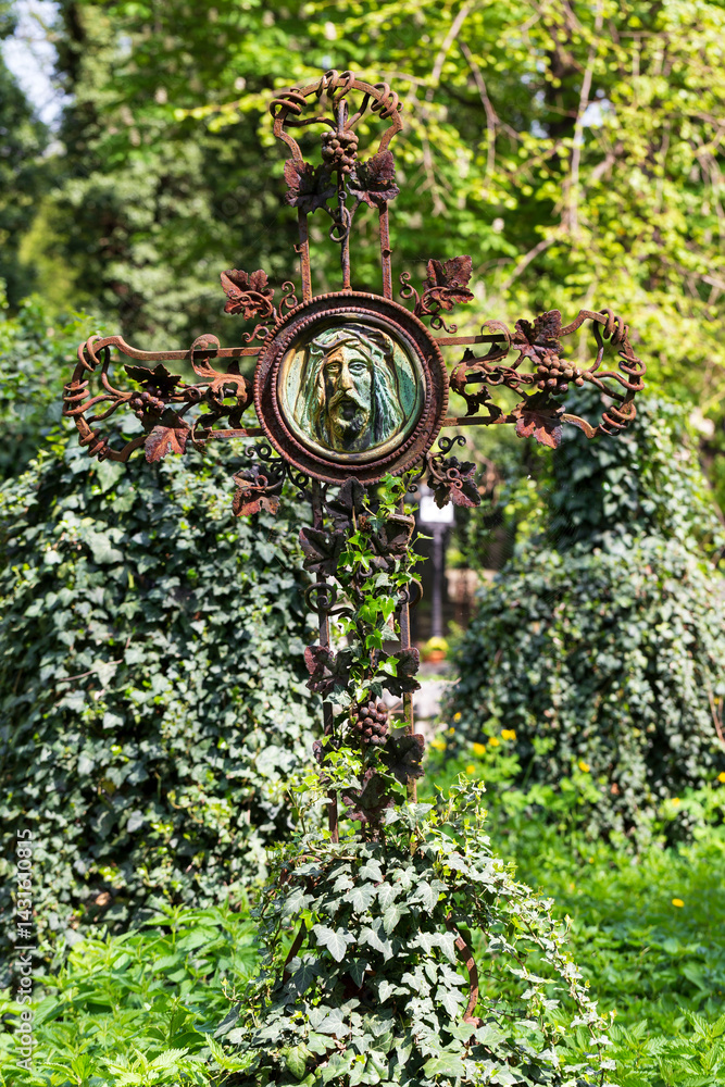 Historic Statue on the spring mystery old Prague Cemetery, Czech Republic