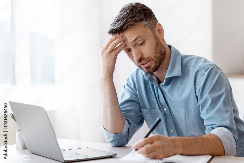 Busy Businessman Taking Notes To Notepad While Working With Laptop At Office, Planning Business Schedule, Having Deadline Stress And Problems At Work, Touching Forehead With Worried Face Expression Busy Businessman Taking Notes To Notepad While Working With Laptop At Office, Planning Business Schedule, Having Deadline Stress And Problems At Work, Touching Forehead With Worried Face Expression