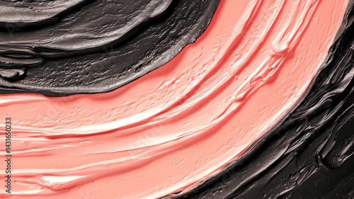 Abstract paint texture featuring a blend of pink and black swirls for artistic backgrounds.