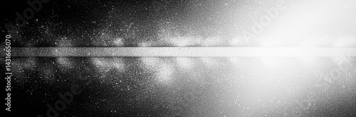 captivating black and white gradient background featuring grainy texture, evoking sense of depth and mystery. interplay of light and shadow creates striking visual effect