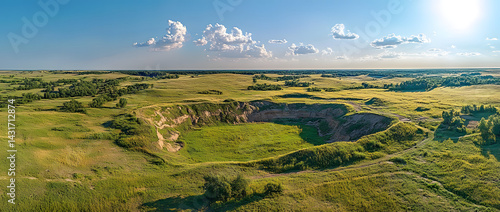 Aerial view massive iron ore quarry. Open pit mining, deep mining operations. Large open-cast mine, industrial landscape. Earthmoving equipment excavates ore, transport dirty materials. Huge open