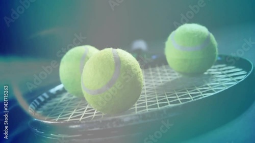 Tennis balls being illuminated, levitating above racket strings with blue teal beams in 3D render