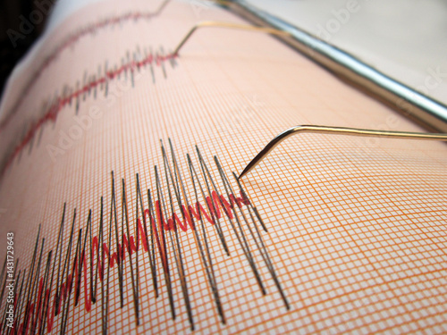 Seismograph and earthquake. A seismograph that records the seismic activity of an earthquake.	