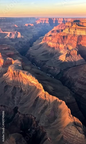 Majestic Grand Canyon at Sunset with Vibrant Colors and Shadows Highlighting the Landscape