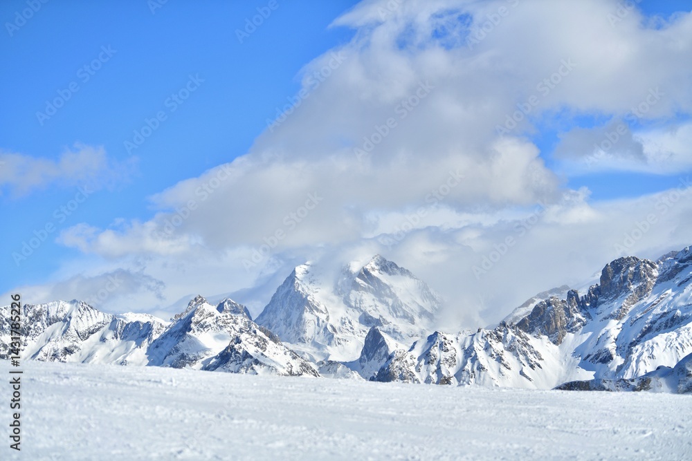 Winter scenery of Courchevel ski resort slopes by winter Winter scenery of Courchevel ski resort slopes by winter