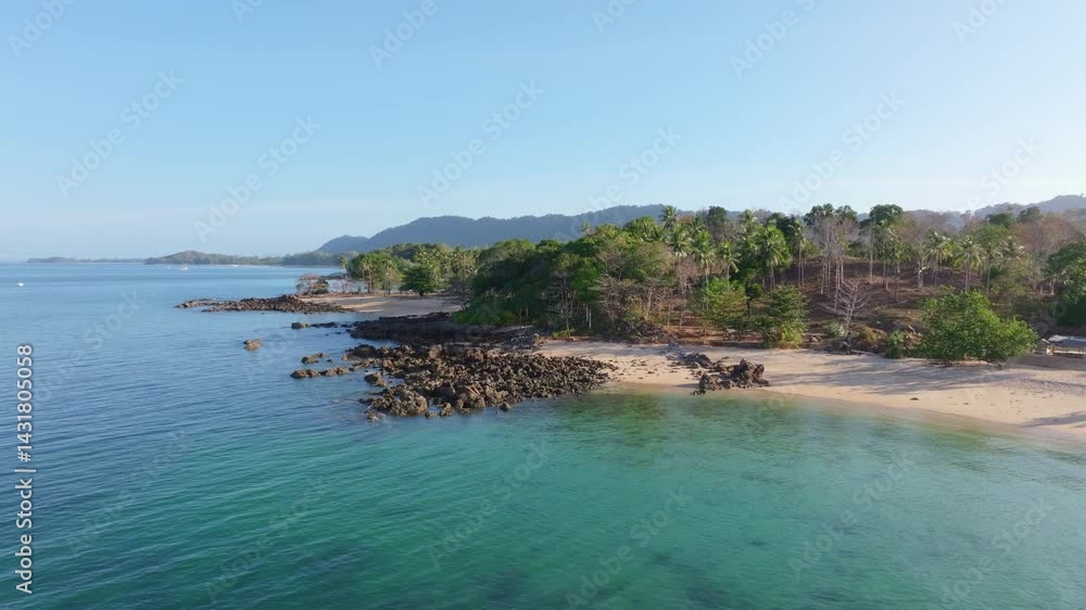 Aerial view of secluded palm-fringed beach, Thailand. Aerial drone video Aerial view of secluded palm-fringed beach, Thailand. Aerial drone video