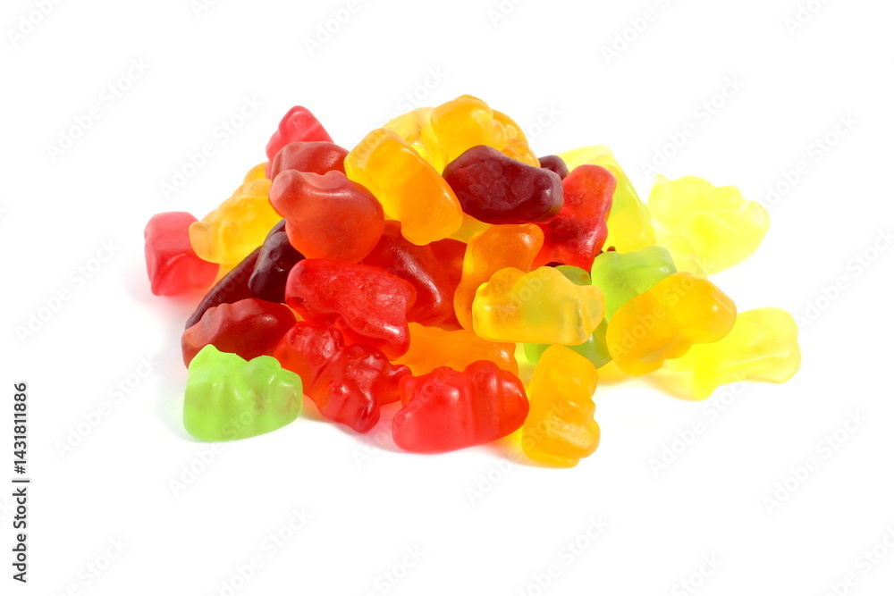 There are many small jelly candies lying on a white background. There are many small jelly candies lying on a white background.
