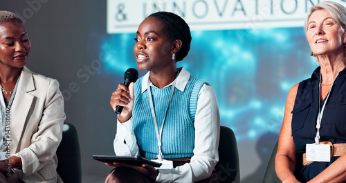 Obraz na płótnie Business women, speaker and microphone for seminar, presentation and audience for conference or convention. People, tablet and question for affirmative action trade show, event or innovation workshop w salonie