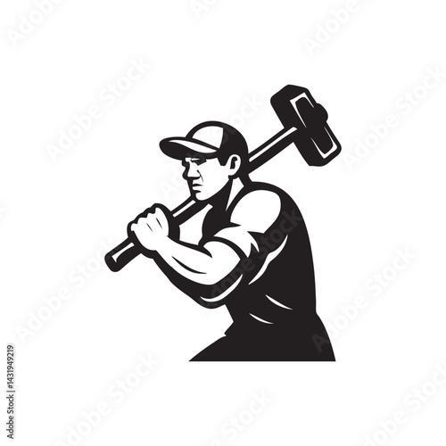man swinging a large sledge hammer