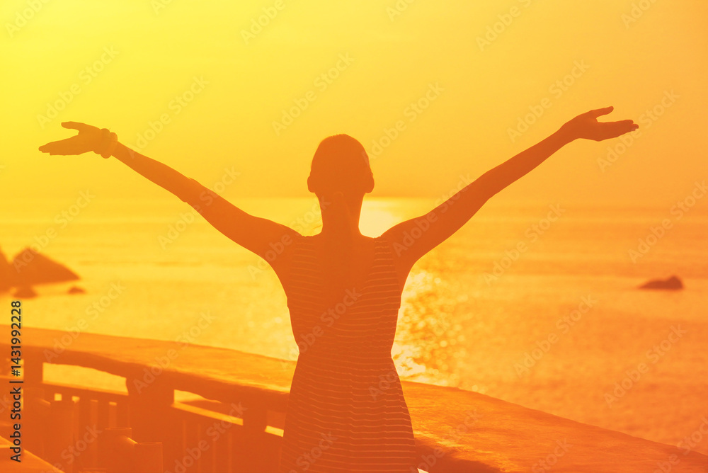 Fototapeta premium Carefree Happy Woman Enjoying Nature sunrise. Freedom concept. 