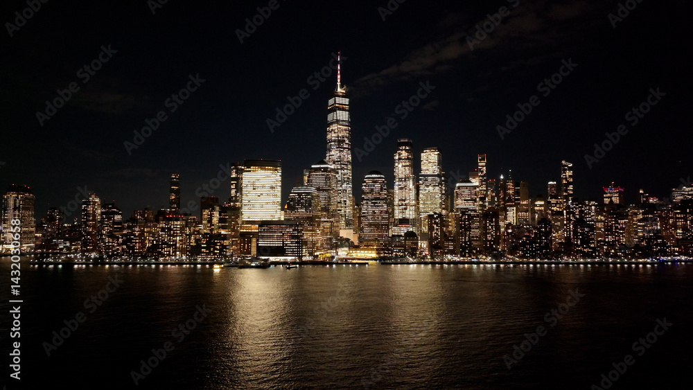 Obraz premium Night Skyline Of New York Skyline At Manhattan In New York United States. Night City Landscape. Financial District. New York Skyline At New York United States. Highrise Buildings Scenery. 