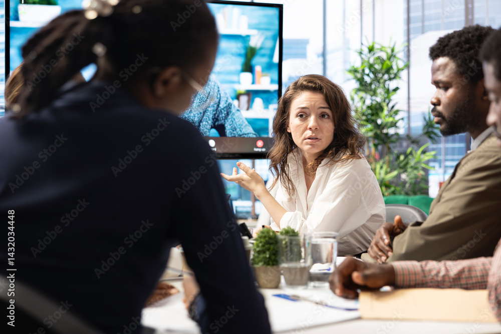 Business colleagues attend an online videocall meeting with a shareholder, presenting the infographics report in order to increase funding. Staff working on global expansion plans.
