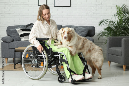 Young woman in wheelchair w...