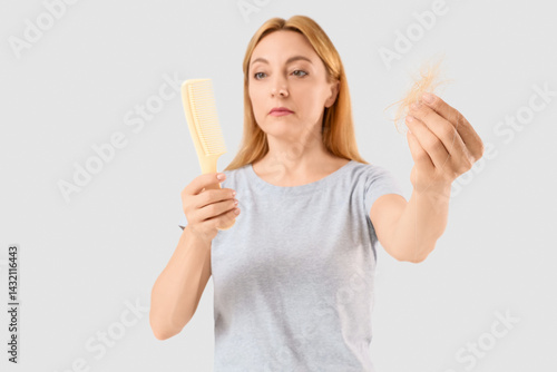Mature woman with hair loss...