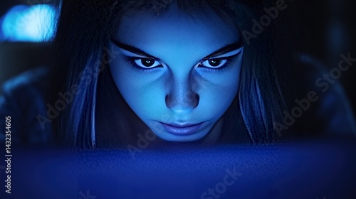 Woman Intense Look with Eye Makeup in Blue Light