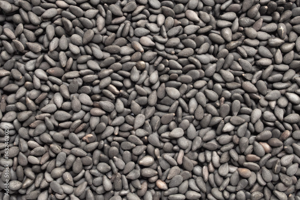 Black sesame seeds texture background close up Black sesame seeds texture background close up