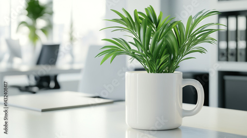Wallpaper Mural White mug mockup with a green plant on a desk in an office room, close-up, white background. Torontodigital.ca