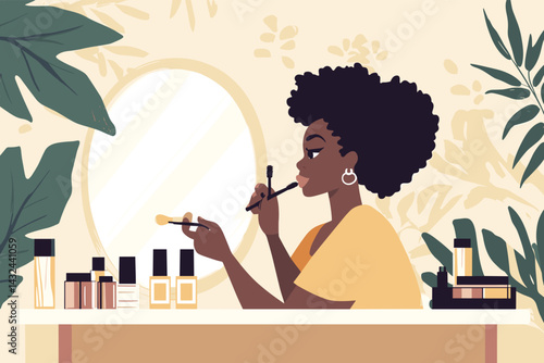 African woman applying makeup in front of mirror with cosmetic bottles on desk, beauty blogger scene vector illustration