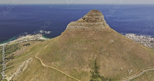Cape Town South Africa Aerial v5 flyover Tamboerskloof around Lion's Head, capturing ocean views, Clifton, Camps Bay, and Bakoven, and Table Mountain - Shot with Mavic 3 Pro Cine - Jan 1st 2024