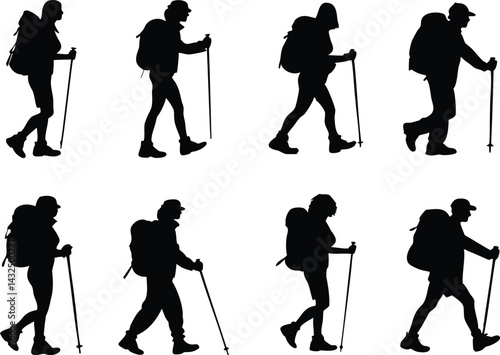 Silhouettes of hikers with backpacks and trekking poles