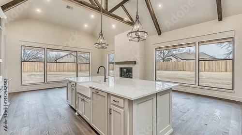 Wallpaper Mural stylish kitchen interior showcases a center island with a farm sink complemented by a striking fireplace and expansive backyard view from large windows Torontodigital.ca