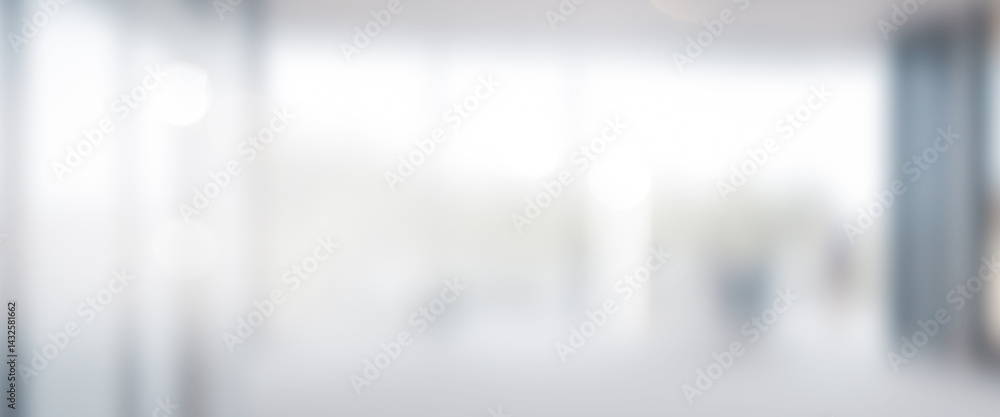 Bright blurred interior with large windows and neutral colors creating a modern space. Professional photos for backgrounds for text, banners, posters, and web displays. Bright blurred interior with large windows and neutral colors creating a modern space. Professional photos for backgrounds for text, banners, posters, and web displays.