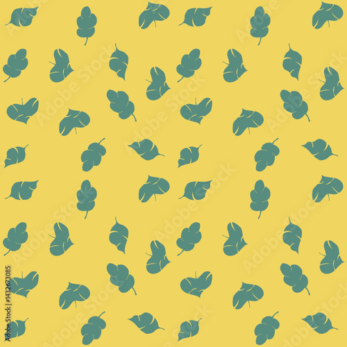 Seamless pattern of leaves or folliage with green colors and yellow background