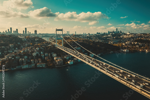 Istanbul Bosphorus Bridge (July 15 Martyrs Bridge). Aerial view of one side of the Bosphorus Bridge with a drone on a cloudy day. Unique view of Istanbul. Turkiye.