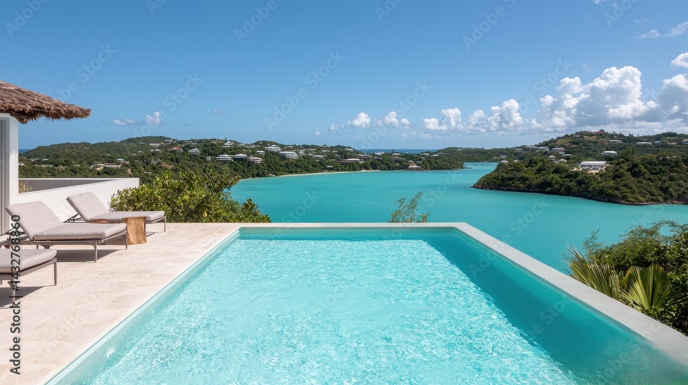 Fototapeta premium Serene Luxury Pool Overlooking Vibrant Turquoise Water in Paradise