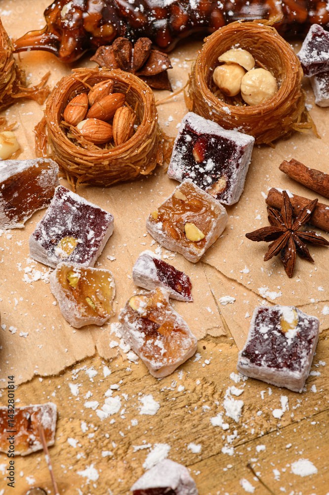 Sweet food Turkish delight on wooden background, assorted locum and candy for decorated backdrop