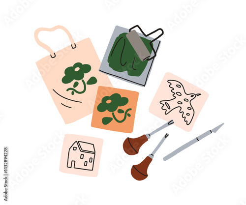 Printing on fabric, textile with stamp, templates and roller. Printmaking cra...
