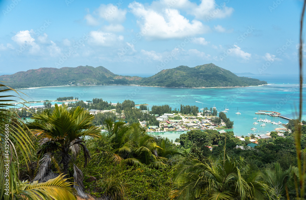 Scenic view from the hill on Praslin Island overlooking Baie Sainte Anne with boats