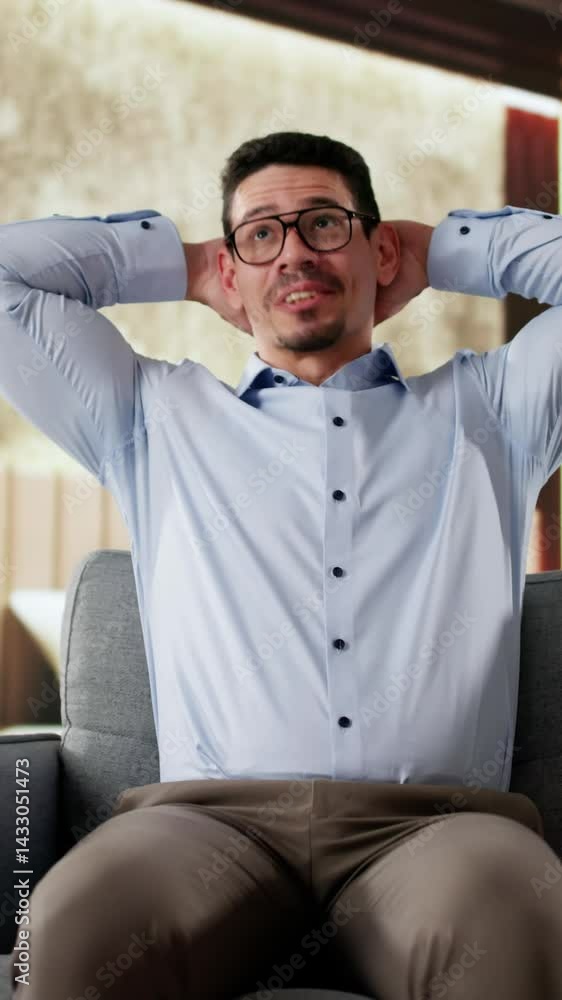 Happy Man Sitting On Sofa Thinking Happy Man Sitting On Sofa Thinking