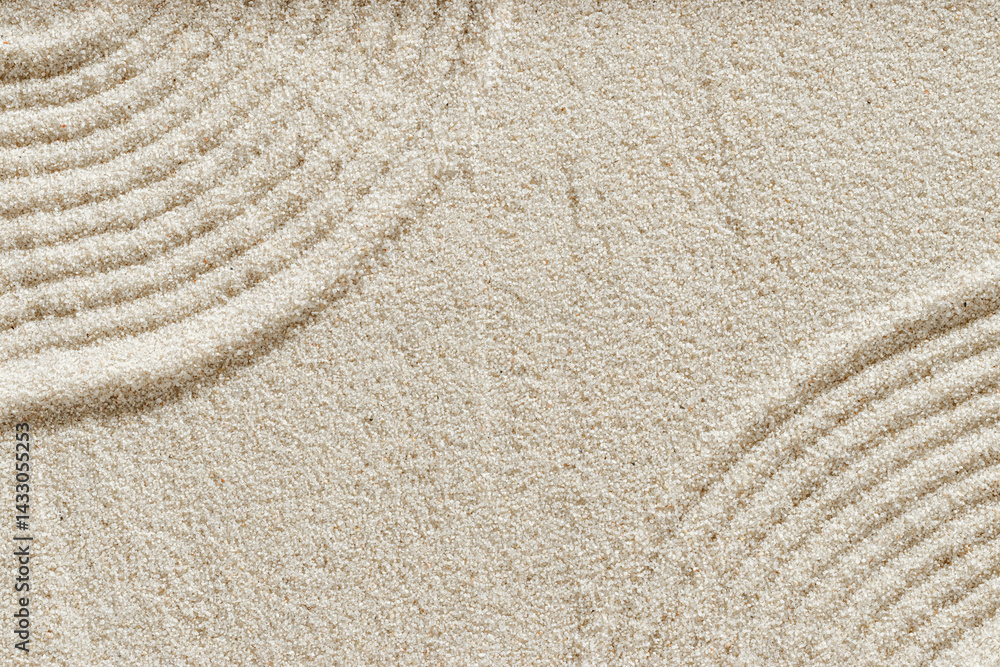 Zen lines on sand, beauty sandy texture. Natural sand background for spa wellness, concept for relaxation balance and harmony, spirituality. Concentration and spirituality in Japanese zen garden