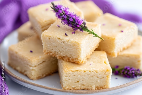 Obraz na płótnie Stack of Buttery Lavender Shortbread Cookies Sprinkled with Sugar on Ceramic Plate w salonie