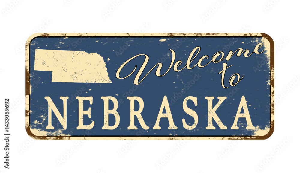 Fototapeta premium Welcome to Nebraska. A worn blue plaque with the name and outline of the state. Welcome inscription on the road sign