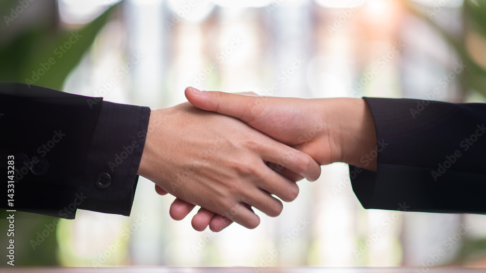 Businessmen shaking hands to indicate a business deal,successful contract management of the company,signing an agreement,business partner,New opportunities for the future of the industry,joint venture