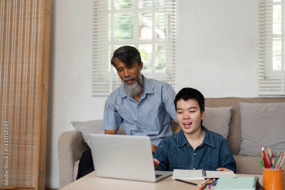 Joyful Moments in Family Life. A grandfather and grandson share an engaging online experience, highlighting the joy of family connections. Joyful Moments in Family Life. A grandfather and grandson share an engaging online experience, highlighting the joy of family connections.