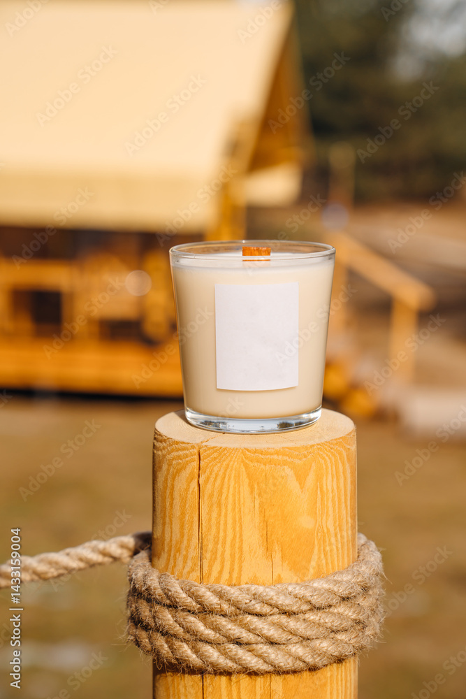 Scented candles on a wooden pole