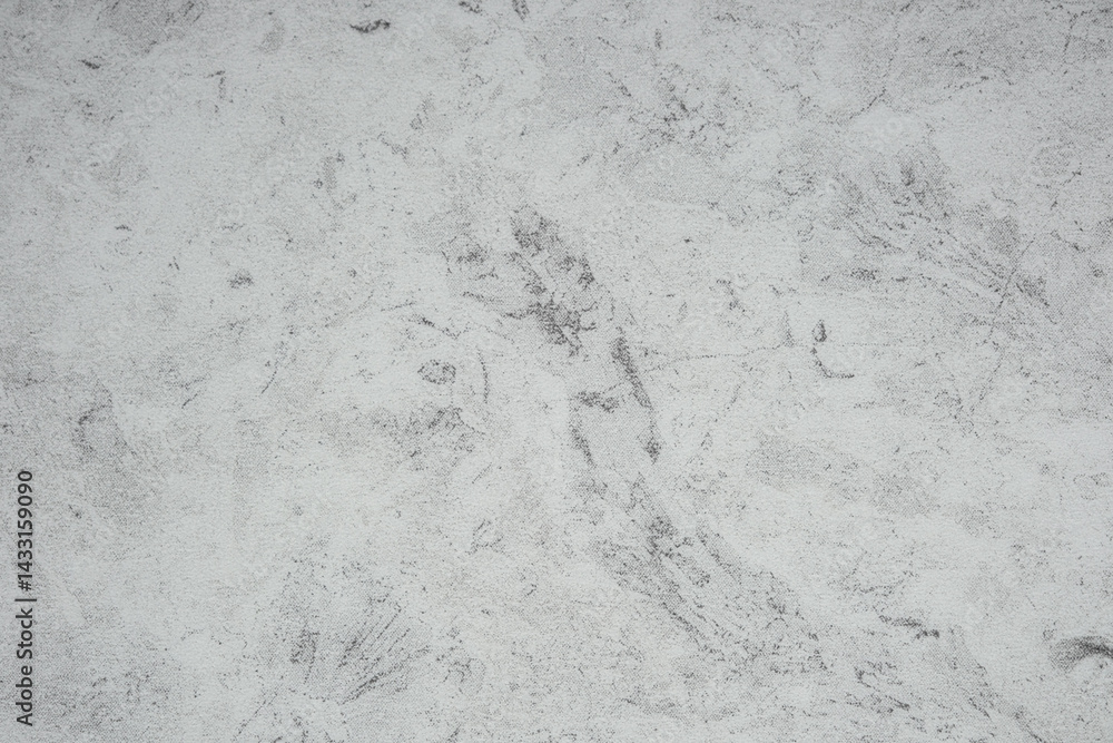 Textured cement surface with subtle variations in gray tones
