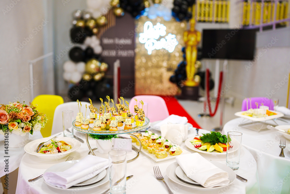 table served Assorted canapes for the festive table. Catering services. table served Assorted canapes for the festive table. Catering services.