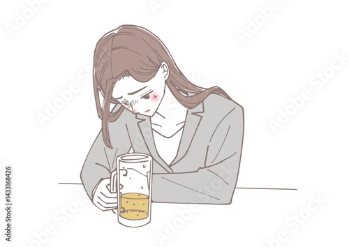 ビールを飲みながら落ち込んでいる女性
