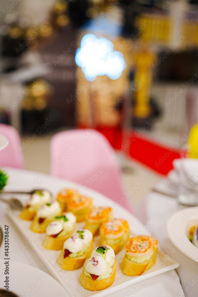 Assorted canapes for the festive table. Catering services for banquets.