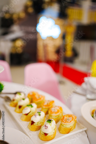 Obraz na płótnie Assorted canapes for the festive table. Catering services for banquets. w salonie