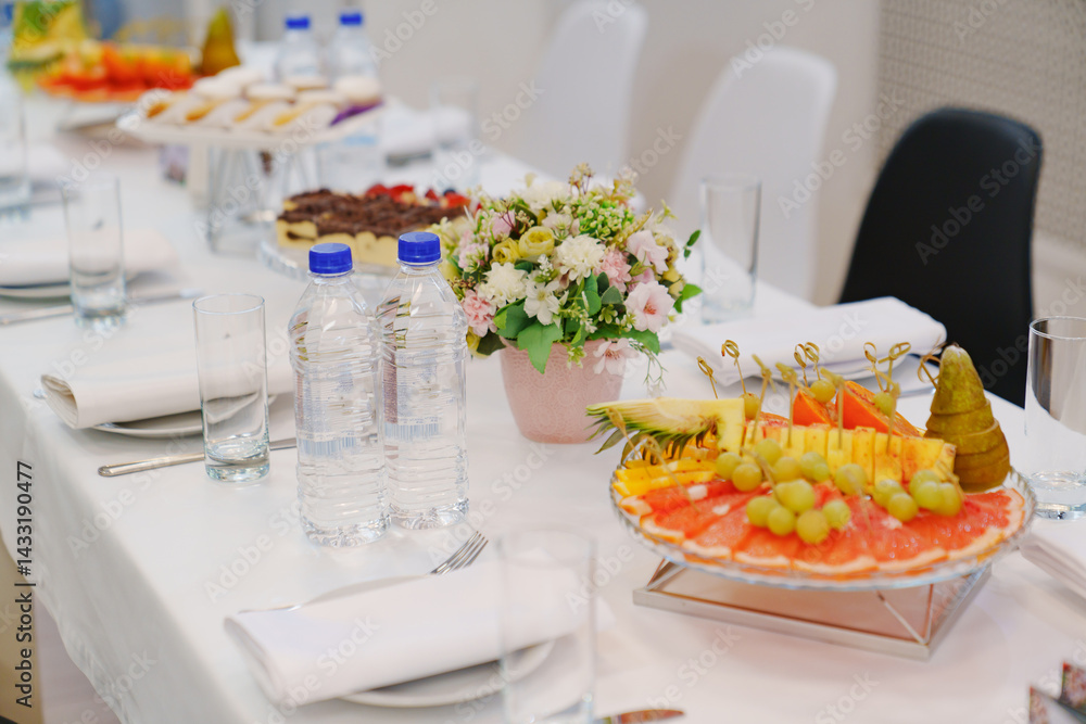 Table served with fruits and desserts for the holiday.