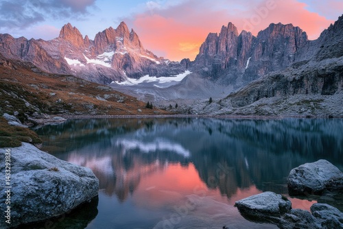 Serene hiking paradise with breathtaking sunset over lake sorapis and majestic snow-capped peaks, perfect for outdoor lovers and adventure seekers in the enchanting dolomites photo
