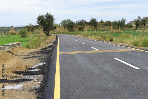Wallpaper Mural Newly constructed asphalt road with clipping path, asphalt highway road with sky clouds natural landscape, asphalt road passing through agricultural fields under blue sky in Chakwal, Punjab, Pakistan Torontodigital.ca