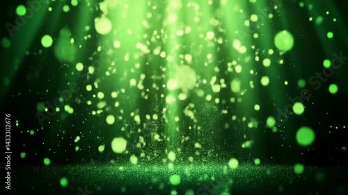 Abstract green bokeh lights create a bright, shiny texture with a holiday sparkle pattern