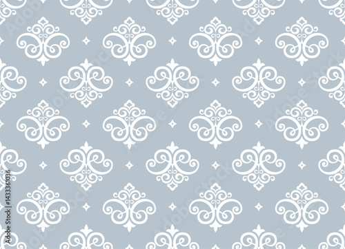 Wallpaper in the style of Baroque. White and gray floral ornament. Seamless vector background. Graphic pattern for fabric, wallpaper, packaging. Ornate Damask flower illustration