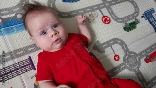 Little Baby Looks Into The Camera Lens